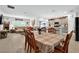 Bright open-plan dining area and living room boasts lots of natural light at 33960 Sky Blossom Cir, Leesburg, FL 34788