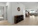Inviting entryway featuring stylish decorations, tile flooring, and seamless transitions to the living spaces at 33960 Sky Blossom Cir, Leesburg, FL 34788