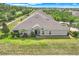 Aerial view of a single story home with a well maintained lawn at 3550 Fairwaters Ct # D, Clermont, FL 34711