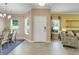 Inviting entryway with tile flooring, dining area and living room view at 3550 Fairwaters Ct # D, Clermont, FL 34711