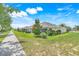 Charming exterior of the house with a landscaped yard and inviting curb appeal at 3550 Fairwaters Ct # D, Clermont, FL 34711