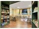Inviting game room with tables, chairs, and shelving filled with an assortment of games and activities at 3550 Fairwaters Ct # D, Clermont, FL 34711