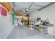 Spacious garage with shelving, storage, and ample room for vehicles at 3550 Fairwaters Ct # D, Clermont, FL 34711
