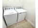 Image of white washer and dryer units located in the laundry room at 358 Switchgrass Loop, Minneola, FL 34715