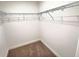 Spacious walk-in closet includes wire shelving for ample storage at 358 Switchgrass Loop, Minneola, FL 34715