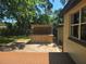 Backyard bar and entertainment space off a house with brick pavers and string lights at 365 Fletcher Ave, Daytona Beach, FL 32114