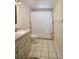 Full bathroom with tub/shower, granite vanity, and tile flooring at 365 Fletcher Ave, Daytona Beach, FL 32114