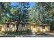 Charming single-story home with a well-maintained front yard and mature trees at 365 Fletcher Ave, Daytona Beach, FL 32114