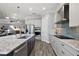 Stylish kitchen with granite counters and stainless steel appliances at 39504 Hillrise Ln, Lady Lake, FL 32159