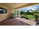 Outdoor patio area with a grill and view of the backyard at 39504 Hillrise Ln, Lady Lake, FL 32159