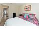 A calming bedroom with door to the backyard at 40140 Palm St, Lady Lake, FL 32159