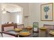 Dining area featuring seating for six, with an archway view of the living room, blending style and functionality at 40140 Palm St, Lady Lake, FL 32159