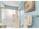 This bathroom features a glass shower and updated fixtures at 4083 Capland Ave, Clermont, FL 34711