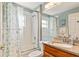 This bright bathroom has a shower/tub combination and updated fixtures at 4083 Capland Ave, Clermont, FL 34711