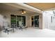 Relaxing covered patio with fan, outdoor seating, and easy access to home at 4083 Capland Ave, Clermont, FL 34711