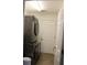 Convenient laundry room with stackable washer and dryer, and easy access door at 41 Dogwood Loop, Ocala, FL 34472