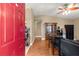 Welcoming entryway leads to an open-concept living space with hardwood floors at 43 Almond Pass Dr, Ocala, FL 34472