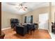 Cozy living room featuring hardwood floors, high ceiling, and natural light at 43 Almond Pass Dr, Ocala, FL 34472