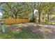 View of the property's spacious, fenced backyard, offering privacy and room for outdoor activities at 43 Almond Pass Dr, Ocala, FL 34472