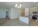 Bright kitchen offering stainless steel appliances, granite countertops, and an open layout for modern living at 532 Silver Palm Dr, Haines City, FL 33844