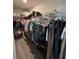The walk-in closet features built-in shelving and ample hanging space for organized storage at 5547 Se 91St Pl, Ocala, FL 34480
