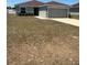 Pleasant single-story home with a neatly kept lawn and a convenient two-car garage, offering both comfort and functionality at 5547 Se 91St Pl, Ocala, FL 34480