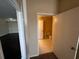Neutral bathroom with tile flooring, a toilet, and a wardrobe at 5560 Metrowest Blvd # 3-204, Orlando, FL 32811