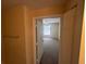 View of a bright bedroom with carpeted floors and a ceiling fan at 5560 Metrowest Blvd # 3-204, Orlando, FL 32811