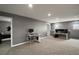 Versatile bonus room with multiple workstations, ideal for a home office or gaming setup at 605 Black Eagle Dr, Groveland, FL 34736