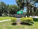 Sign for the Ronald Sefton Gaffney Memorial Park with mature landscaping and well maintained lawn at 605 Black Eagle Dr, Groveland, FL 34736