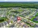 This home is surrounded by lush trees and situated within a well-maintained community, offering a serene environment at 6301 Whittle Ct, The Villages, FL 32163
