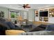 Cozy living room with custom built-ins, bay window and luxury vinyl flooring at 717 Southeast 46Th Ct, Ocala, FL 34471