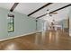 Bright and airy living room with wood-look floors and plenty of natural light at 717 Southeast 46Th Ct, Ocala, FL 34471