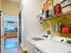Laundry room with a washer and dryer and doorway to the kitchen at 750 Eden Pl, The Villages, FL 32162