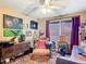 Cozy office with comfortable furniture, printer, and vintage décor at 750 Eden Pl, The Villages, FL 32162