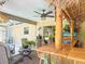 Patio tiki bar and patio seating area at 750 Eden Pl, The Villages, FL 32162