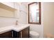Bathroom featuring modern vanity, mirror, and towel bars at 841 S Michigan Ave, Groveland, FL 34736