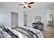 Bedroom with wood floors, a ceiling fan, closet and vanity at 841 S Michigan Ave, Groveland, FL 34736