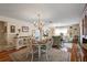 Spacious, combined living and dining area filled with natural light and stylish decor at 851 Evelynton Loop, The Villages, FL 32162