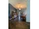 Dining area with slate flooring, modern lighting, and elegant furniture at 901 Baylor Dr, Deltona, FL 32725