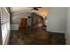 Open-concept living room with tile flooring and ample natural light at 901 Baylor Dr, Deltona, FL 32725