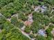 Aerial photo illustrates a verdant landscape embracing a clearly marked property, offering privacy and room at 9144 Sw 156Th Pl, Dunnellon, FL 34432