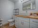Bathroom featuring a modern woodgrain countertop and a vessel sink at 9144 Sw 156Th Pl, Dunnellon, FL 34432