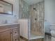 Updated bathroom featuring a modern vanity, tiled shower, and stylish fixtures at 9144 Sw 156Th Pl, Dunnellon, FL 34432