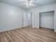An open bedroom features light-colored flooring with an open closet space at 9144 Sw 156Th Pl, Dunnellon, FL 34432
