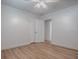 An open bedroom with modern flooring and a doorway view to another room at 9144 Sw 156Th Pl, Dunnellon, FL 34432