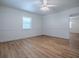 Bedroom featuring updated flooring and natural light from a window at 9144 Sw 156Th Pl, Dunnellon, FL 34432