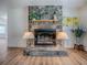 Close-up of a stone fireplace with decorative elements, adding charm to the living space at 9144 Sw 156Th Pl, Dunnellon, FL 34432