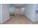 Spacious hallway showcasing updated flooring and neutral paint, connecting multiple living areas at 9144 Sw 156Th Pl, Dunnellon, FL 34432