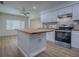 Beautiful kitchen featuring an island with butcher block counter and stainless-steel appliances at 9144 Sw 156Th Pl, Dunnellon, FL 34432